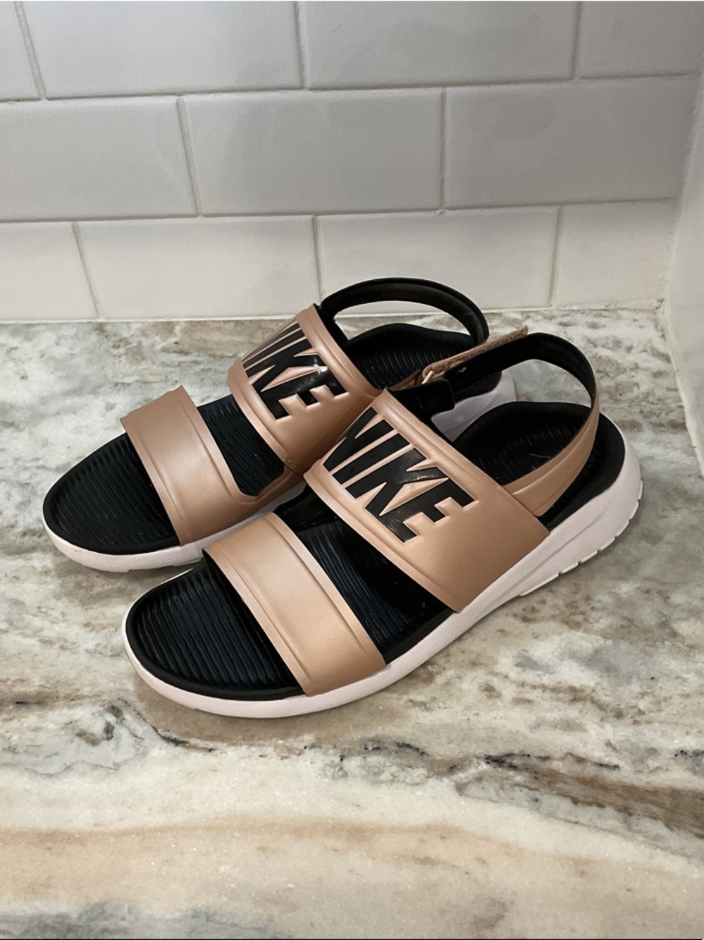 Nike Rose Gold and Black Slide Sandals